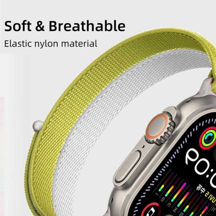 Lime green and white nylon loop band attached to a smartwatch