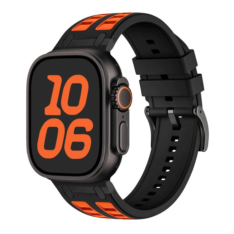 Two-tone silicone watch band in black and orange.