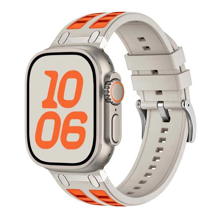 Silicone watch band in light gray with orange accent inlays, shown fitted on a watch