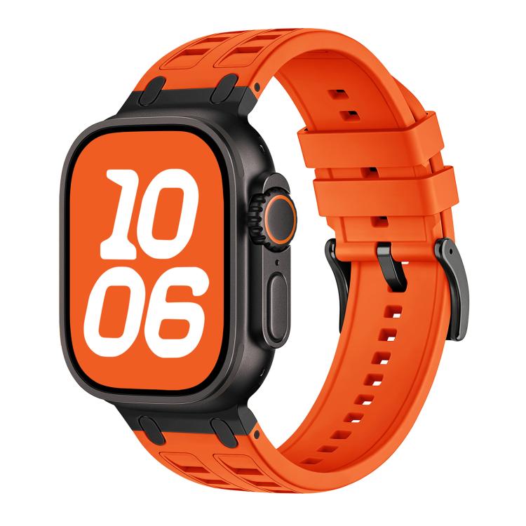 Bright orange silicone watch band with black accents, shown fitted on a watch
