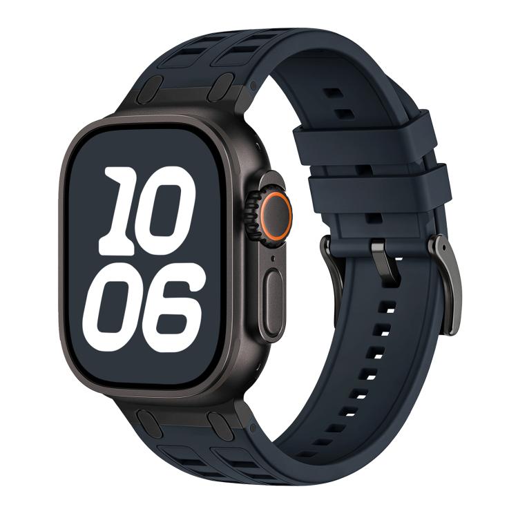 Dark blue-gray silicone watch band with black accents, shown fitted on a watch
