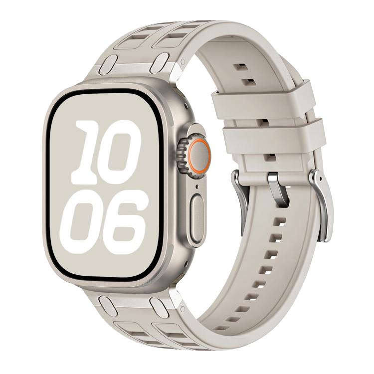 Light gray silicone watch band with matching accents, shown fitted on a watch