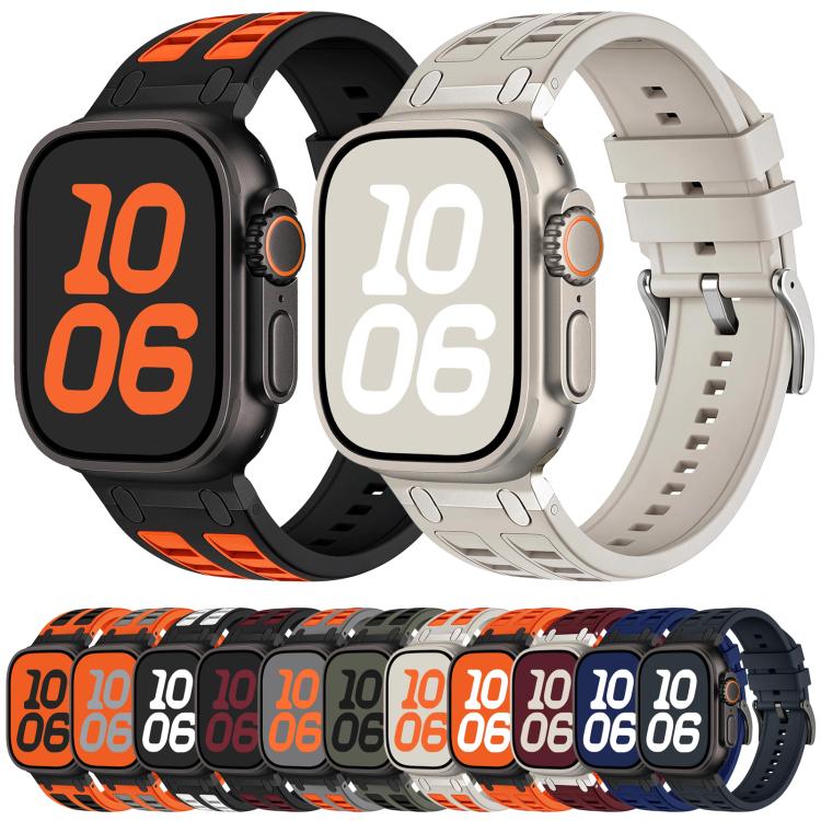 Two-tone silicone watch bands in black and orange and light gray, shown on watches
