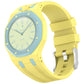 Yellow silicone watch with light blue accents, textured dial, and stainless steel buckle