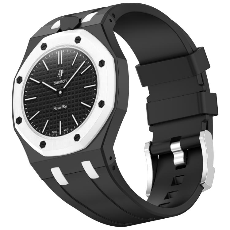 Black silicone watch with white accents, textured dial, and stainless steel buckle