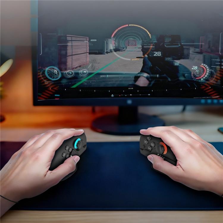 Two black gaming mouse grips held by hands in front of a monitor
