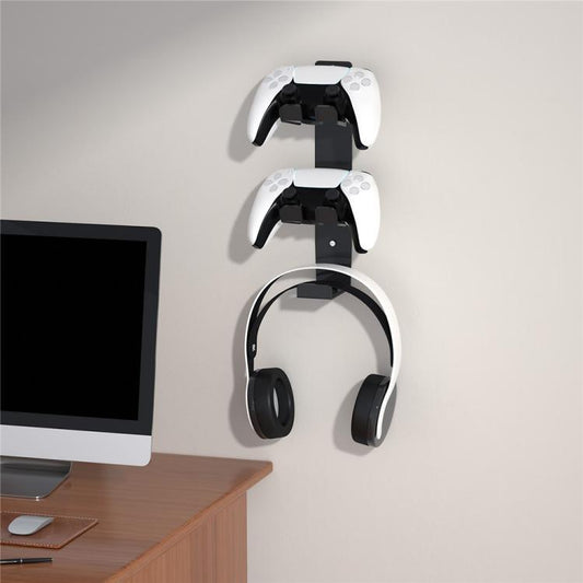 Wall-mounted stand holding two controllers and a headphone set with curved support