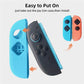 Black Joy-Con controller case covers with thumb sticks and button cutouts