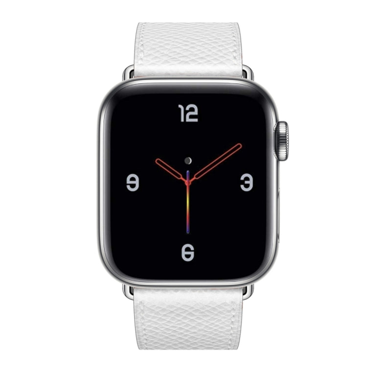 White leather Apple Watch cross-band strap shown on watch face