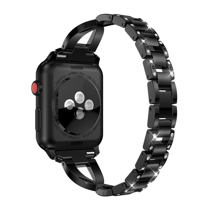 Smartwatch with black X-shaped metal link strap and red side button detail