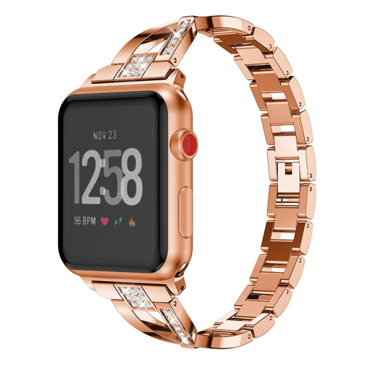 Smartwatch with rose gold X-shaped metal link strap and red side button detail