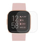 Full-coverage TPU screen protector film on Fitbit smartwatch display, transparent overlay