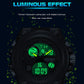 Close-up sport wristwatch with green luminous dial and dark silicone case, digital numbers visible.