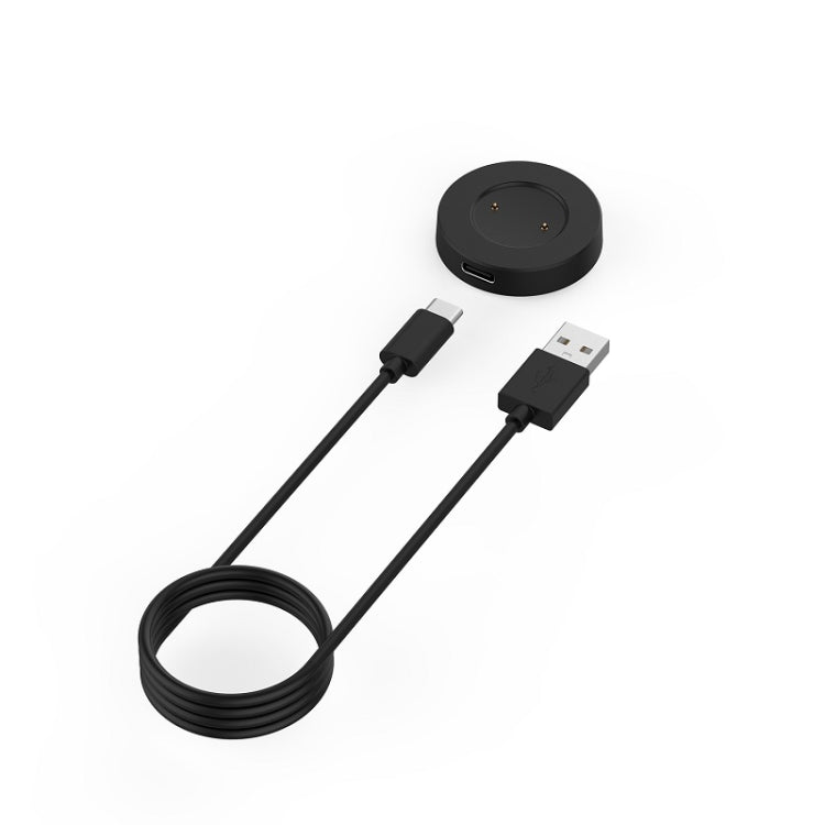 Black magnetic charging dock with USB cables, round base and cable ends