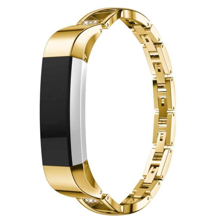Gold metal X-shaped watch strap with linked segments and clear rhinestone accents