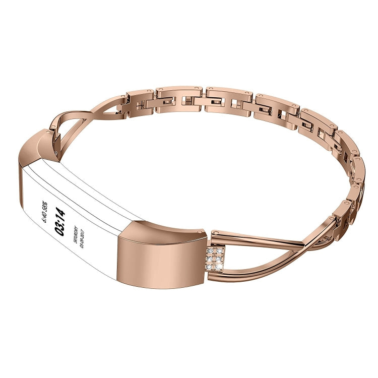 Rose gold metal watch strap with linked segments and rhinestone on clasp