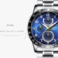 Men's multi-function quartz wristwatch with blue dial, three subdials, and steel bracelet
