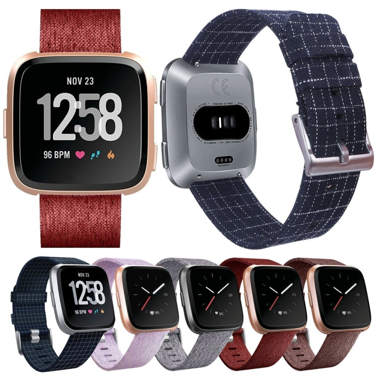 Assorted nylon canvas smartwatch straps in red and navy with metal buckles and connectors