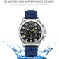 Silver-tone sport quartz watch with black dial and blue leather strap, water splash theme.