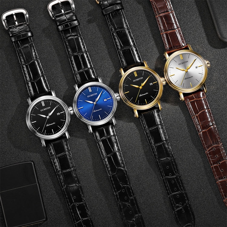 Set of four men's automatic watches with leather straps in black, blue, gold, and brown