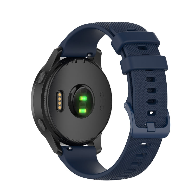 Navy blue silicone watch strap with textured holes and rectangular clasp detail