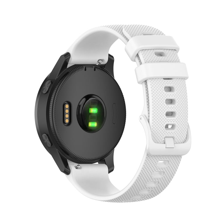 White silicone smartwatch strap with perforated texture and clasp buckle, adjustment holes