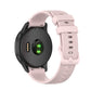 Silicone watch strap in light pink with textured perforation pattern and clasp