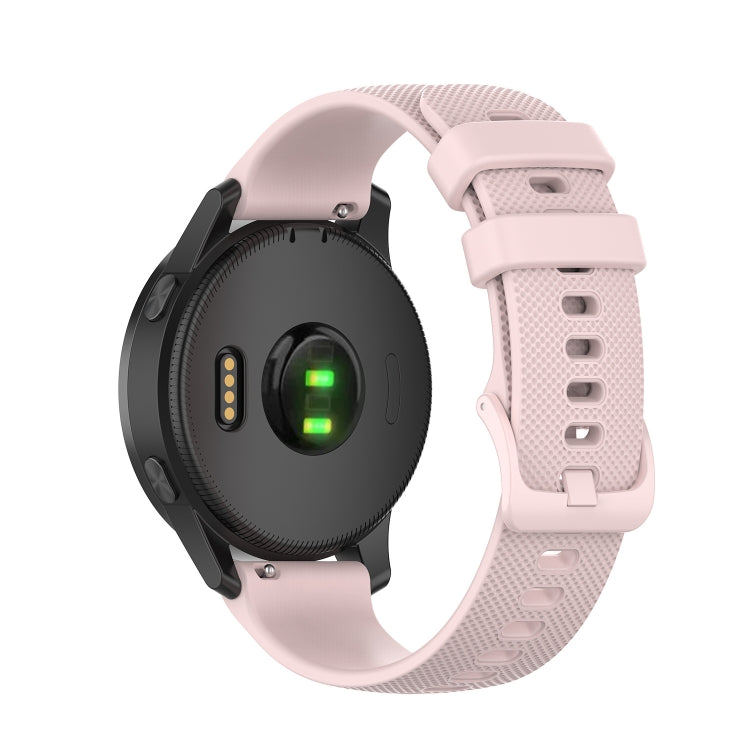 Silicone watch strap in light pink with textured perforation pattern and clasp