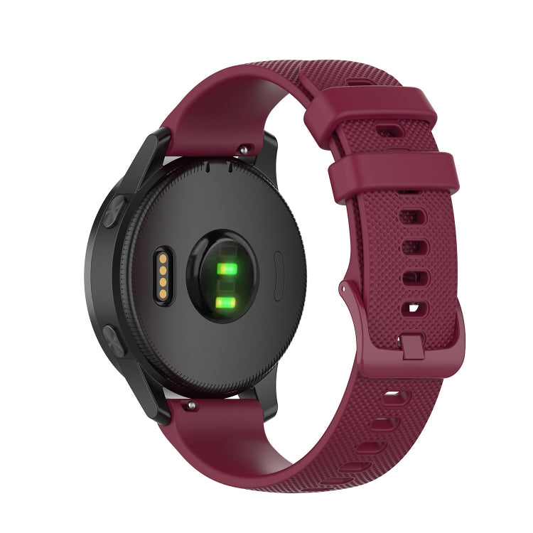 Silicone watch strap in wine red with textured grip pattern and rectangular buckle
