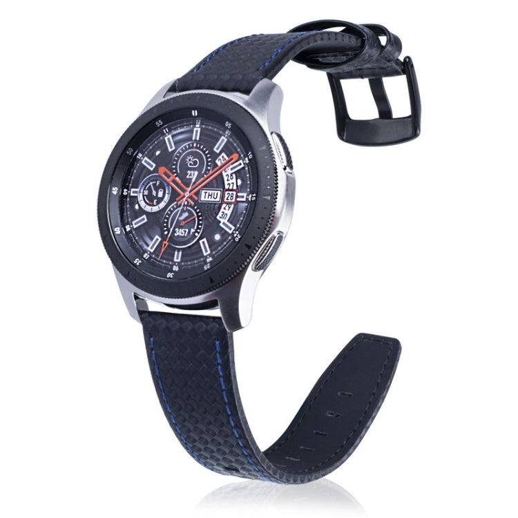Black carbon fiber leather watch strap with blue stitching and metal buckle