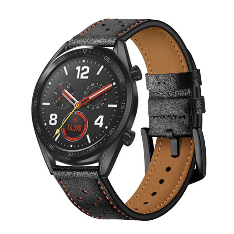 Black leather watch strap with orange stitching and perforations, tan underside.