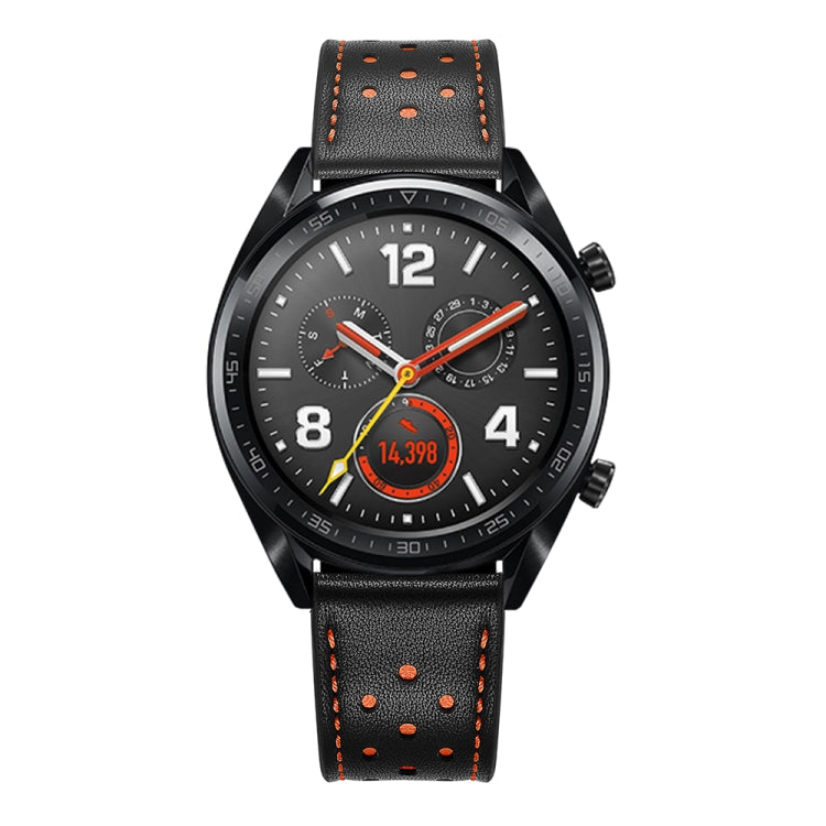 Black leather watch strap with orange stitching, punched holes, and adjustable slots.