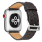 Black braided Apple Watch strap with silver buckle and quick-release pins