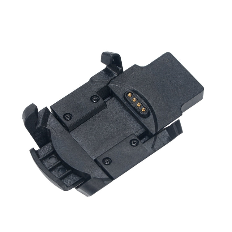 Black Garmin charging cradle with exposed gold charging contacts and spring clips