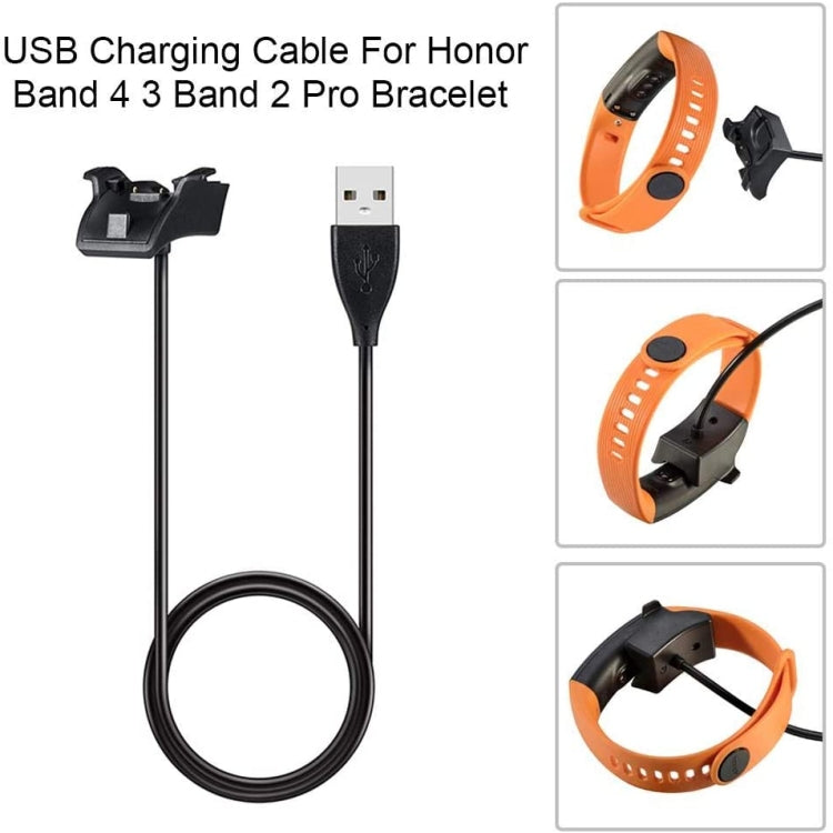 USB charging cable kit with black dock clip and orange Honor bracelet band