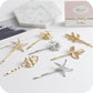 Set of gold and silver hair clips with starfish and leaf motifs