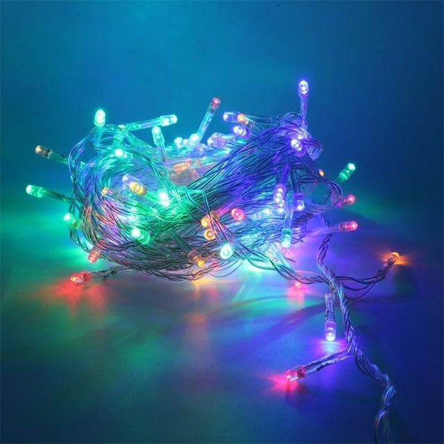 50M LED string lights with multicolor bulbs on transparent wire, glowing decoration