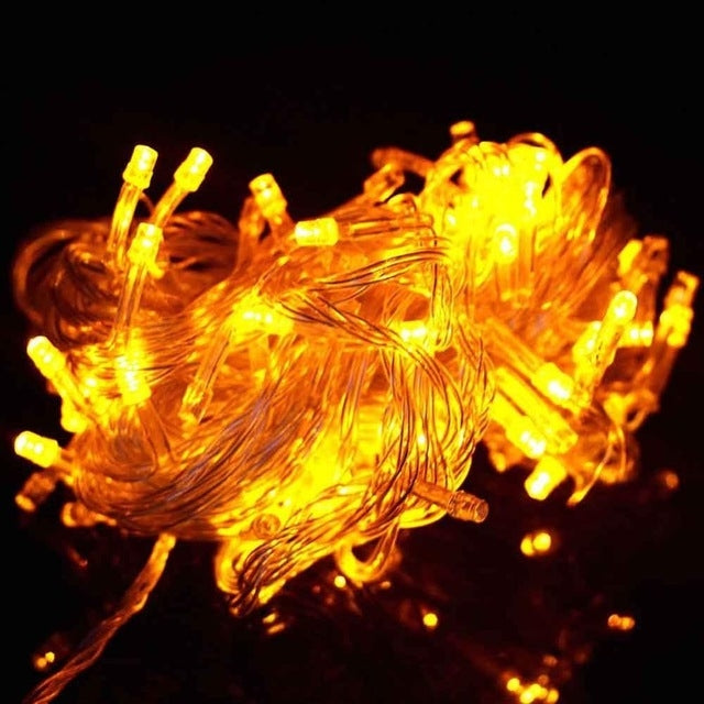 LED string lights with warm yellow bulbs on clear wire, 400 LEDs