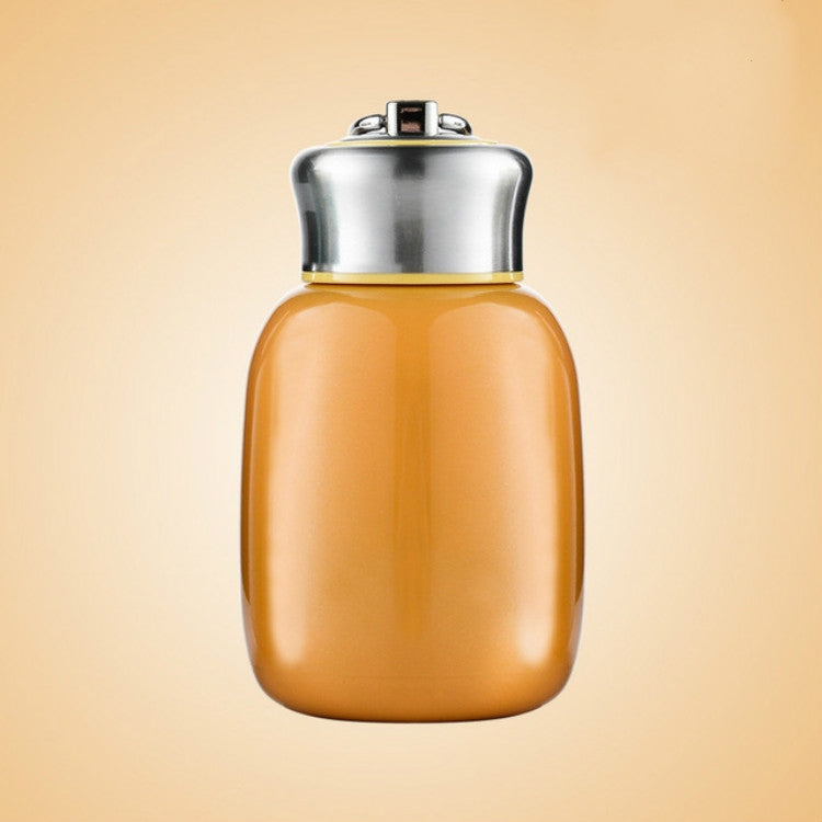 Mini vacuum flask water bottle with orange body and stainless steel flip-top lid.
