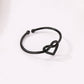 Adjustable black heart hollow ring with open loop band and heart cutout
