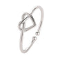 Silver adjustable heart hollow ring with open loop band and heart cutout
