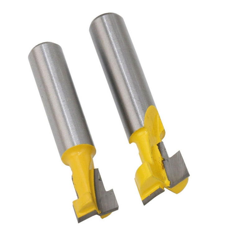 Keyhole milling cutters with yellow collars and metal cutting inserts on silver shafts
