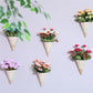 Set of small hanging rattan vase baskets in mixed colors, cone planters with flowers