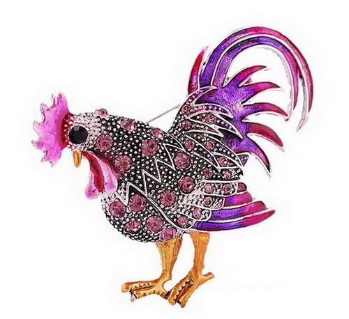 Purple rooster enamel brooch with jeweled speckles, pink comb, and arched tail