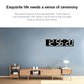 LED digital wall clock with white digits on black panel reading 12:58:20