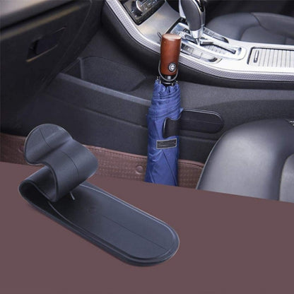 Car seat umbrella hook holder clip with black grip and brown connector