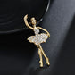 Gold-tone ballerina brooch with crystal tutu, curved pose and raised arms