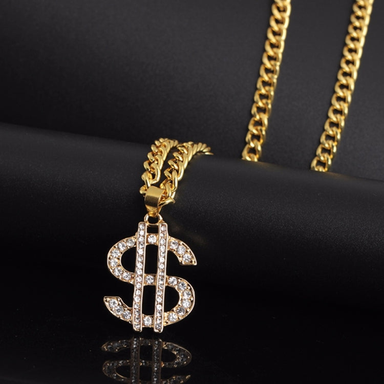 Gold-tone chain necklace with rhinestone dollar-sign pendant, side view