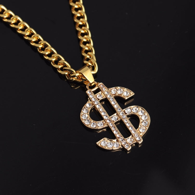 Gold-tone chain necklace with rhinestone dollar-sign pendant, angled close-up