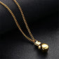 Gold boxing glove charm necklace with rounded pendant and chain links